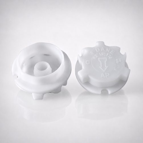 White LERC-approved LPG cylinder valve safety caps molded by Aditya Plastics
